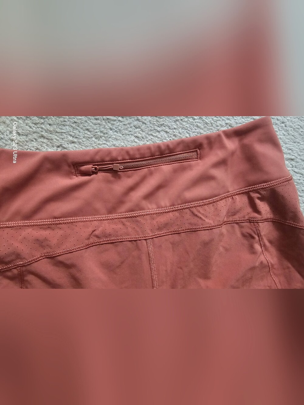 Athleta running shorts coral color feature a wide waistband and a side tag. Smal - Picture 8 of 8